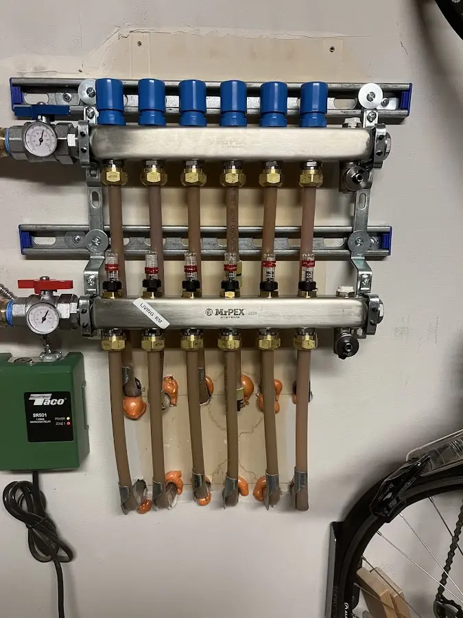 Plumber performing Water Heater Repair at a residential property in New Port Richey